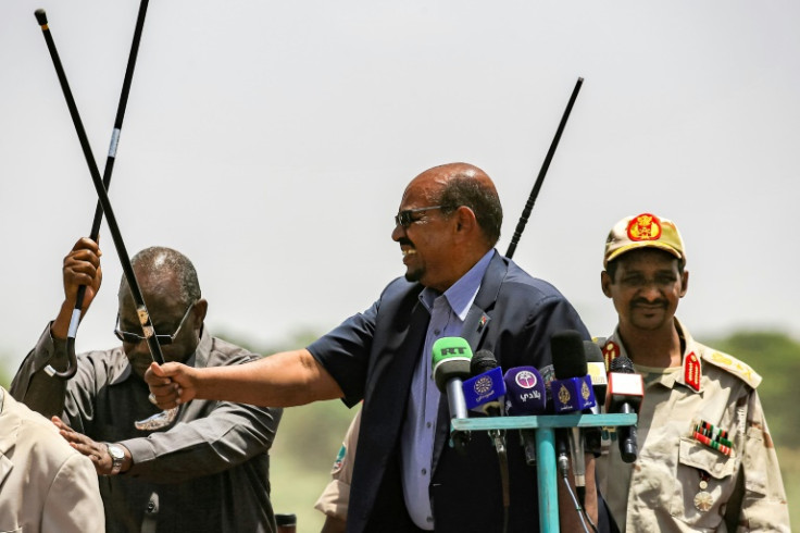 Former autocrat Omar al-Bashir (centre) has not faced justice