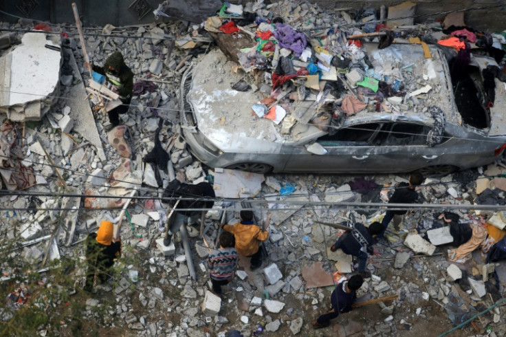 A street in Rafah is strewn with rubble after Israeli bombardment on February 9