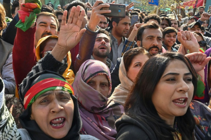Supporters of Imran Khan's Pakistan Tehreek-e-Insaf (PTI) party shout slogans in an election protest in Islamabad