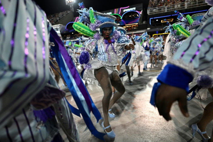 Members of the Porto da Pedra samba school perform during the first night of the Carnival parade at the Marques de Sapucai Sambadrome in Rio de Janeiro, Brazil on February 11, 2024