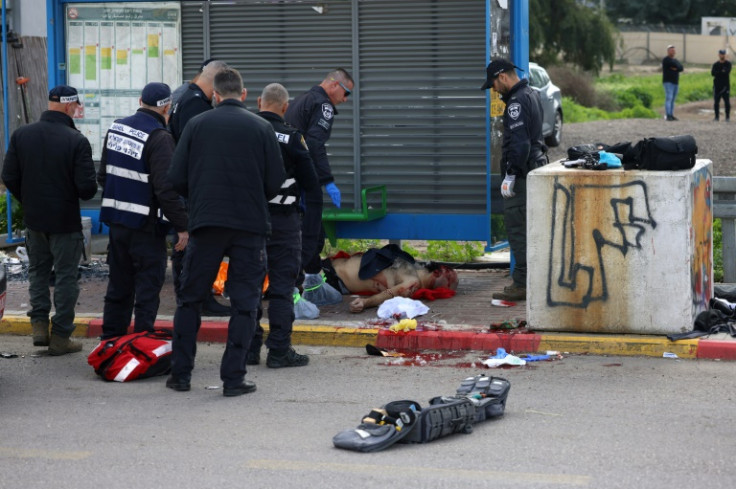 A gunman killed two people at a crowded bus stop in the southern Israeli town of Kiryat Malakhi