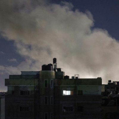 Smoke billows over buildings during Israeli bombardment in the Rafah area of the southern Gaza Strip