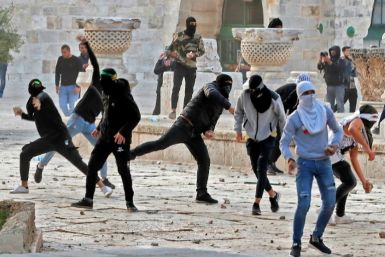 Palestinian demonstrators clash with Israeli police at the Al-Aqsa mosque compound during Ramadan in 2022