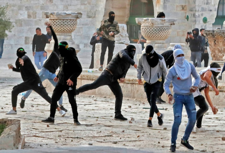 Palestinian demonstrators clash with Israeli police at the Al-Aqsa mosque compound during Ramadan in 2022