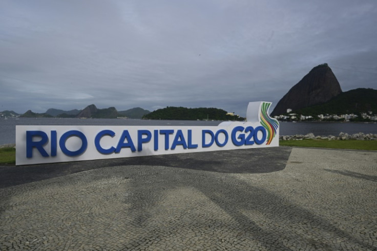 A G20 Brazil sign is seen in front of Rio de Janeiro's iconic Sugarloaf Mountain