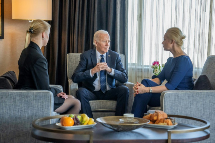 US President Joe Biden (C) meets with Yulia Navalnaya (R), widow of Kremlin opposition leader Alexei Navalny, and daughter Dasha Navalnaya (L) in San Francisco, California in this image released by the White House