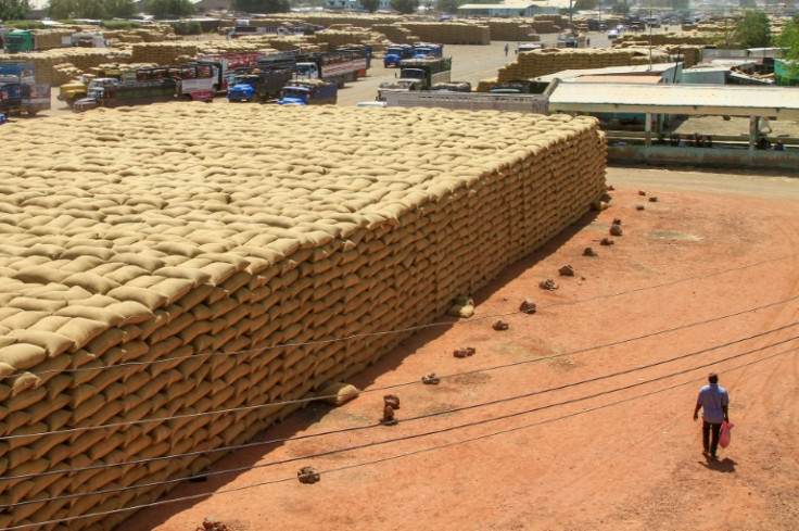 Grain is stacked at a market in Gedaref, eastern Sudan -- but most of the country's agricultural land is out of commission, a research group said