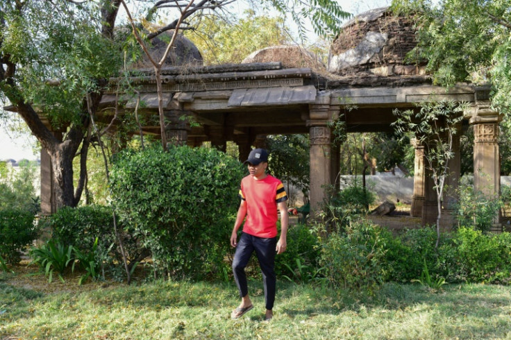 Sheikh Mohammad Tahir, an Indian national recruited to join the Russian war effort in Ukraine and who then fled Russia after beginning basic training, walks in a park in Ahmedabad