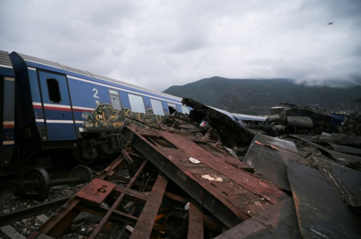 Greek workers are demanding answers about last year's head-on train collision, which killed 57 people and injured dozens more