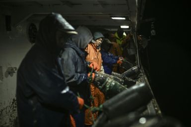 Indonesia fishermen aboard the trawler 'O Fugitivo' off the village of Caxinas near Porto