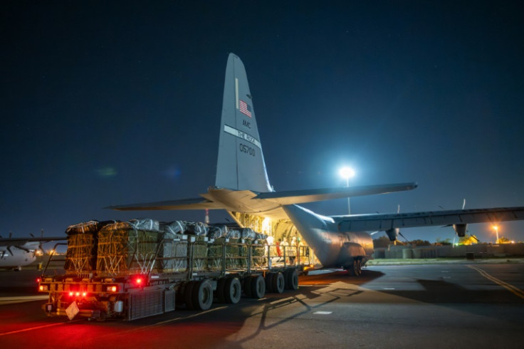 Over 38,000 meals Ready-to-Eat and water destined for an airdrop over Gaza are loaded aboard a US Air Force C-130J Super Hercules at an undisclosed location