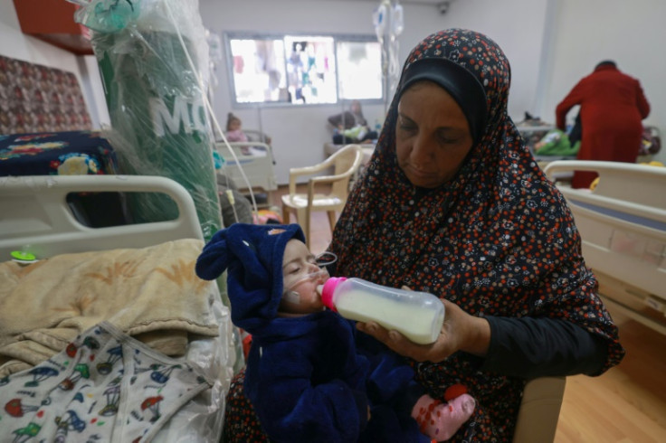 Palestinian children suffering from malnutrition receive treatment in Rafah in the southern Gaza Strip
