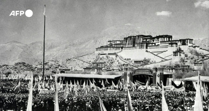 Tibetans gather during the uprising against Chinese rule March 10, 1959 in front of the Potala Palace (former home of the Dalai Lama) in Lhasa, the capital of Tibet