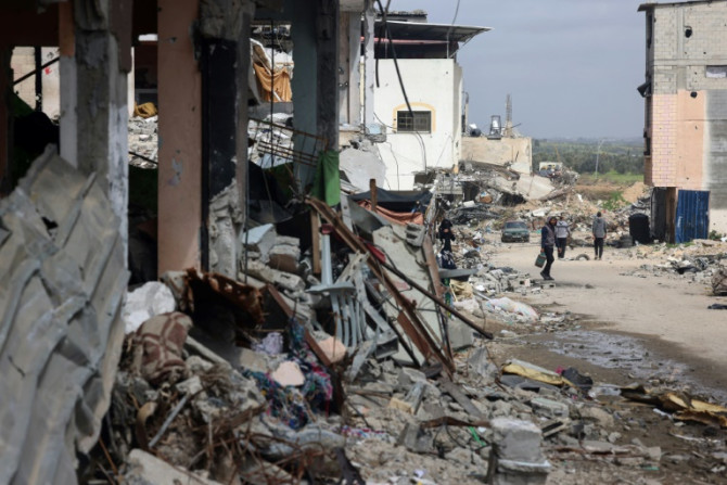 Much of the territory of 2.4 million people has become a hellscape of bombed-out neighbourhoods, emaciated children and mass graves dug in the sand
