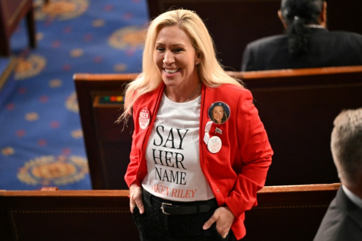 US Representative Marjorie Taylor-Greene (R-GA) wears a shirt and button showing slain Georgia college student Laken Riley ahead of US President Joe Biden's State of the Union address in the House Chamber of the US Capitol in Washington, DC, on March 7, 2