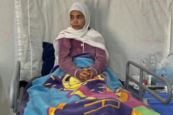 Palestinian girl Hala Hazem Hamada, 15, recovers at a hospital in Rafah, after spending three days under the rubble after an encounter with Israeli troops that left her parents and four other relatives dead