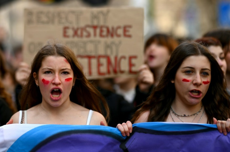 In Italy, thousands of people marched in Rome and Milan