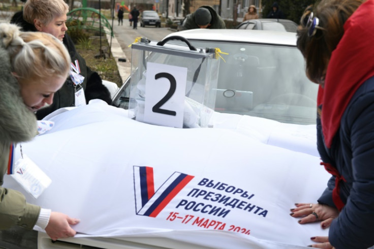 Mobile voting stations have been set up in parts of Ukraine under Russia's control.