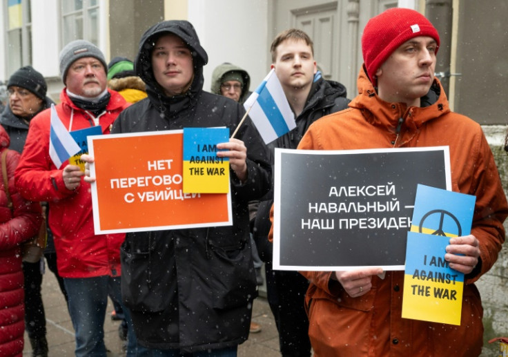 A protestor in Tallinn held a sign reading 'Alexey Navalny, our president'