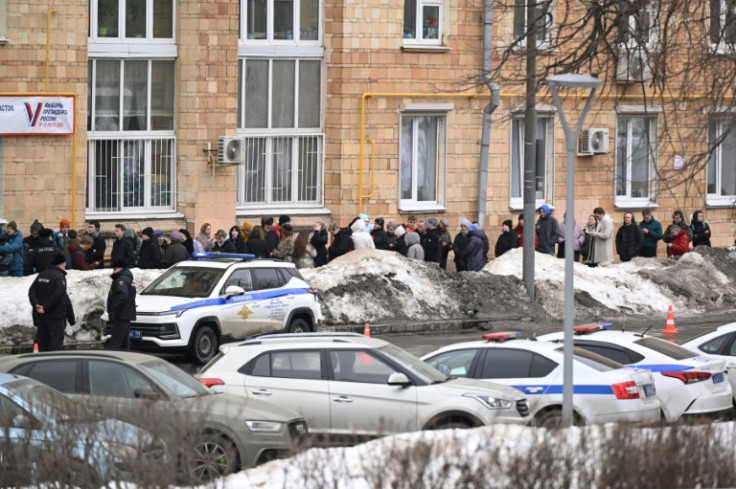 Defying the threat of arrest, Russians formed unusually long queues outside polling stations on Sunday