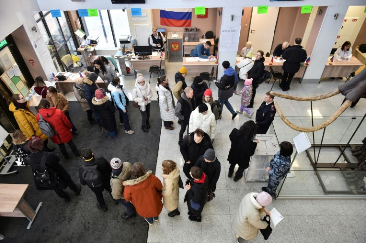 Russians formed queues at polling stations in what they said was a legal and safe way to protest against the Kremlin