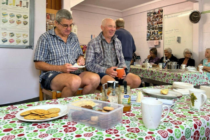 Banter flows during the morning tea break as members chat over scones and hot drinks