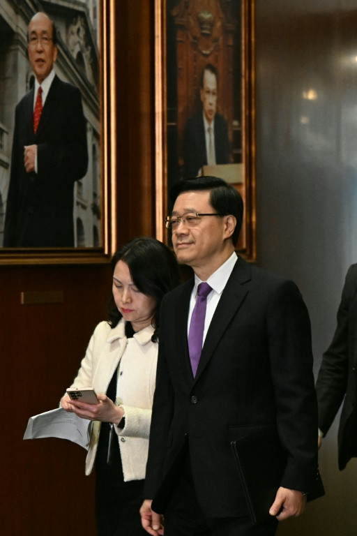 Hong Kong Chief Executive John Lee arrives at the Legislative Council after the conclusion of the readings of the city's new security law