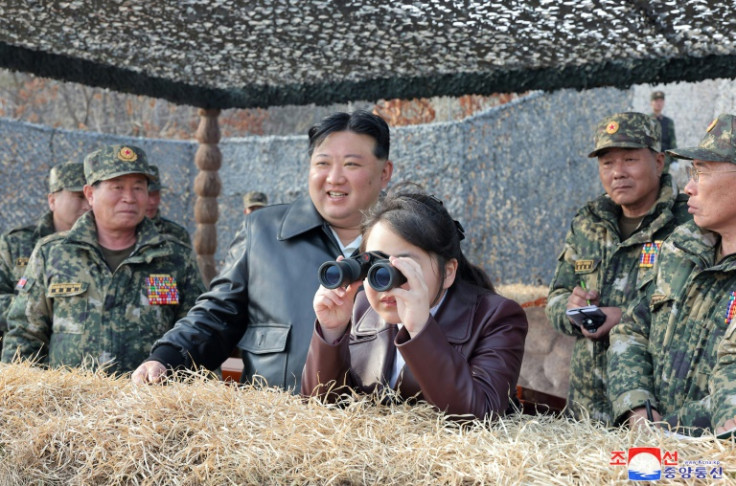 Ju Ae, seen peering through binoculars, has accompanied her father Kim Jong Un to a series of military events