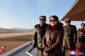 Kim Jong Un's daughter Jue Ae (C) has followed her leather jacket-loving father's sartorial lead
