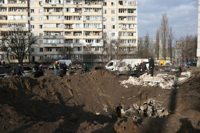 Local officials said falling debris from the missiles injured 17 -- 13 in Kyiv and four in the surrounding region