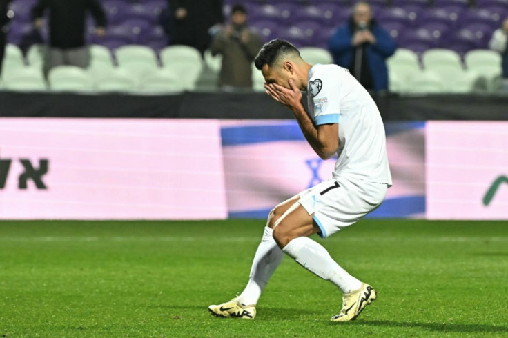 Tough moment: Israel's Eran Zahavi reacts as he misses from the penalty spot