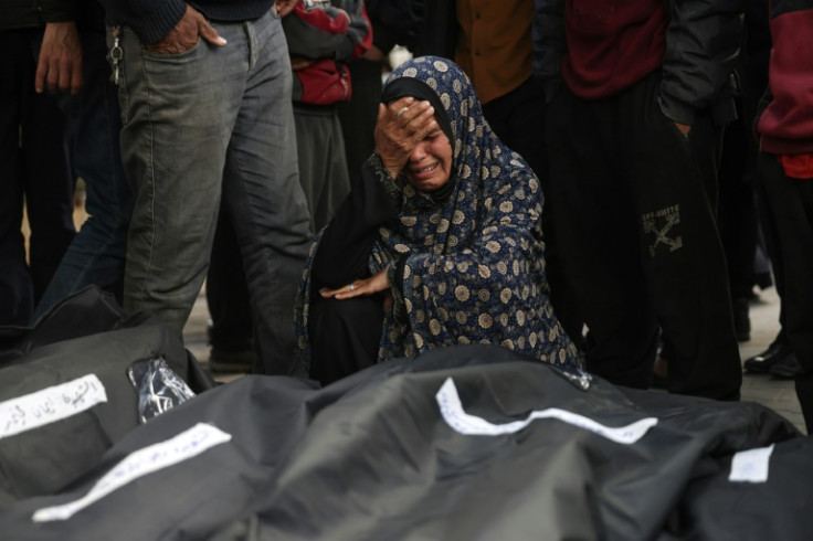 A Palestinian woman mourns relatives killed in overnight Israeli bombardment at the al-Najjar hospital in Rafah in the southern Gaza Strip on March 25, 2024