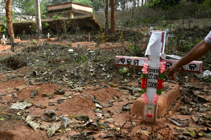 The grave of a Christian killed in India's Odisha state: India's United Christian Forum (UCF) rights watchdog recorded 731 attacks against Christians in India in 2023 warning of "vigilante mobs comprising religious extremists"