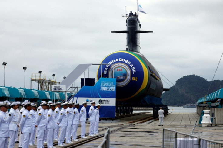 Brazil's navy soldiers stand in front of the Tonelero submarine during its inauguration at the Itaguai naval base