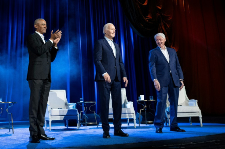 Biden (C) raised $25 million at the New York fundraiser alongside ex-presidents Barack Obama (L) and Bill Clinton