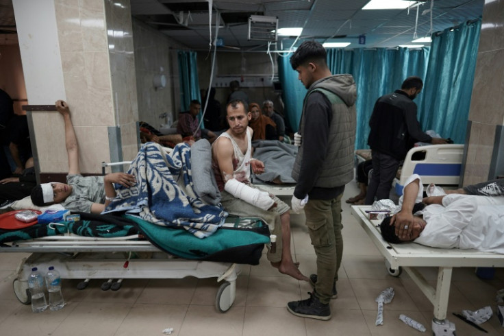 Injured Palestinians receive treatment at the Shuhada al-Aqsa Hospital in Deir el-Balah in the central Gaza Strip on April 3, 2024