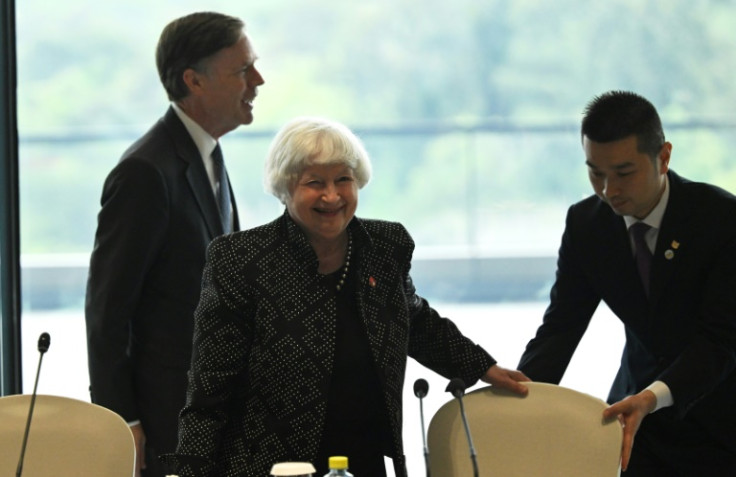 US Treasury chief Janet Yellen (C) and Ambassador to China Nicholas Burns (L) attend a roundtable with business leaders in Guangzhou