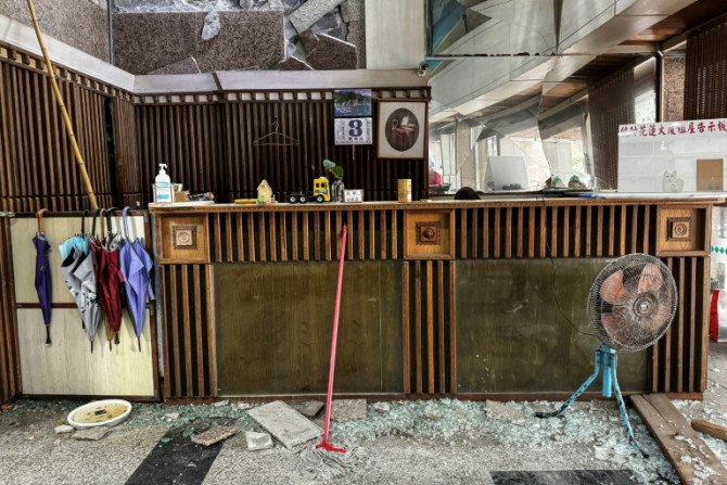 Debris is seen scattered around the lobby of an apartment building, partially damaged in the April 3 earthquake in Hualien