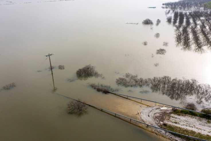 A submerged road in the newly formed Lake Karla, which used to be farmland