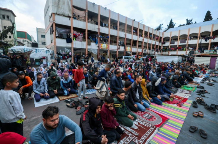 Displaced Palestinians at morning prayers for the Eid al-Fitr festival, marking the end of the holy month of Ramadan, at a school-turned-shelter in Rafah, southern Gaza