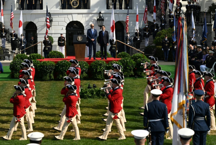 US President Joe Biden and Japanese Prime Minister Fumio Kishida walk along the colonnade to the Oval Office of the White House in Washington, DC, on April 10, 2024.