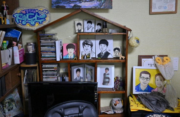 Portraits of Jung Dong-soo, who died when the overloaded Sewol ferry capsized off South Korea's southern coast in 2014