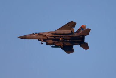 An Israeli army F-15 fighter jet flies over central Israel