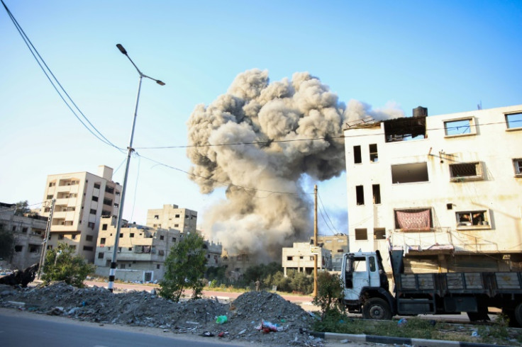 A plume of smoke billows during Israeli bombardment in Gaza City on April 16, 2024, amid ongoing battles between Israel and the Palestinian Hamas movement