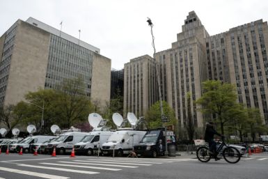 Media vehicles outside of the Manhattan Criminal Court building as former US President Donald Trump attends his trial