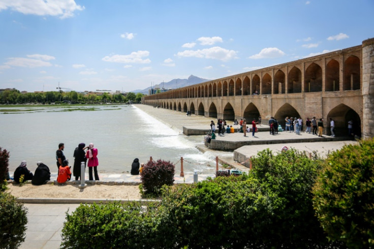 Iranians visit the Si-o-Se Pol Bridge in Isfahan city -- the UN's atomic watchdog said nuclear sites in the surrounding region were undamaged