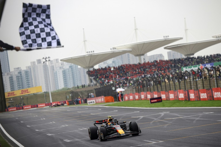 Max Verstappen takes the chequered flag to win the Chinese Grand Prix