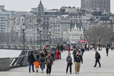 Visitors in March 2024 tour the Bund promenade in Shanghai, which Secretary of State Antony Blinken will be visiting