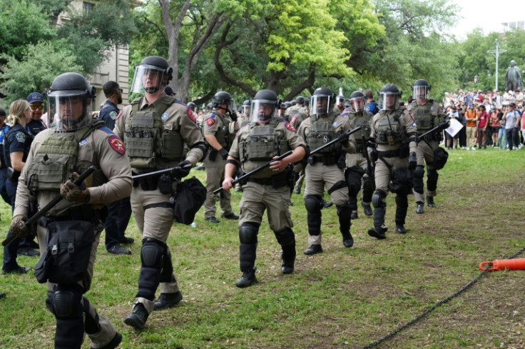 Texas state troopers walk on the campus of the University of Texas as pro-Palestinian students protest the Israel-Hamas war in Austin on April 24, 2024