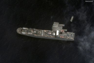 A satellite photo shows the USNS Roy P Benavidez ship and sections of a floating pier under construction off Gaza to assist aid efforts
